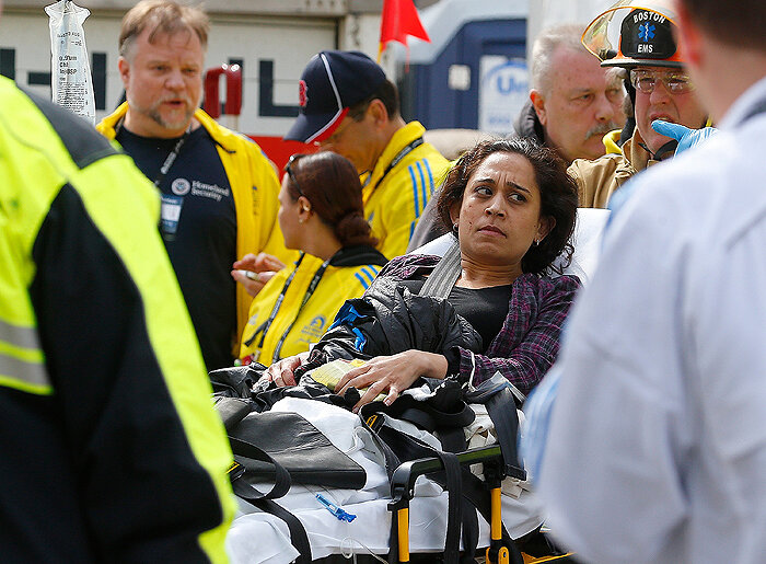 Последствия взрывов в Бостоне. Источник фото: AFP PHOTO/John MOTTERN