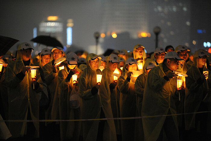 Акция «Час Земли», Китай, 23 марта 2013. Источник: AFP PHOTO/ Peter PARKS
